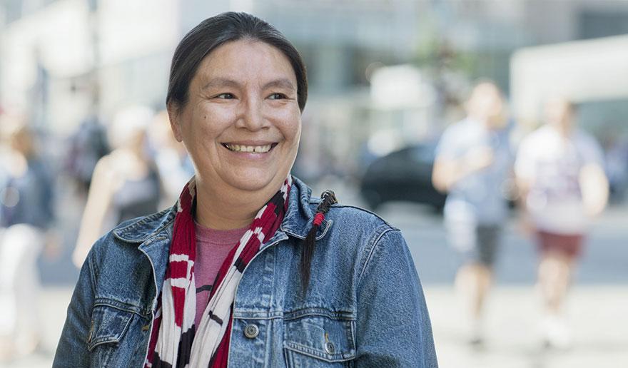 Woman smiling on the street