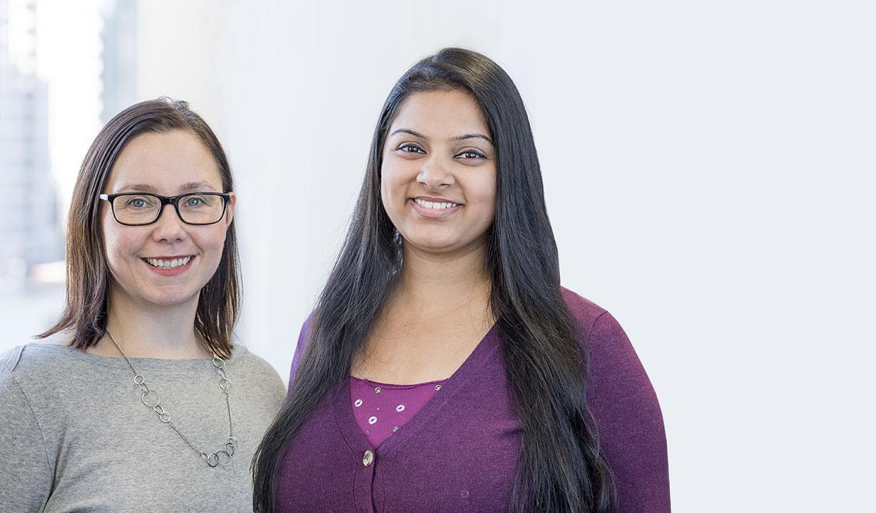 two Ontario Health employees smiling